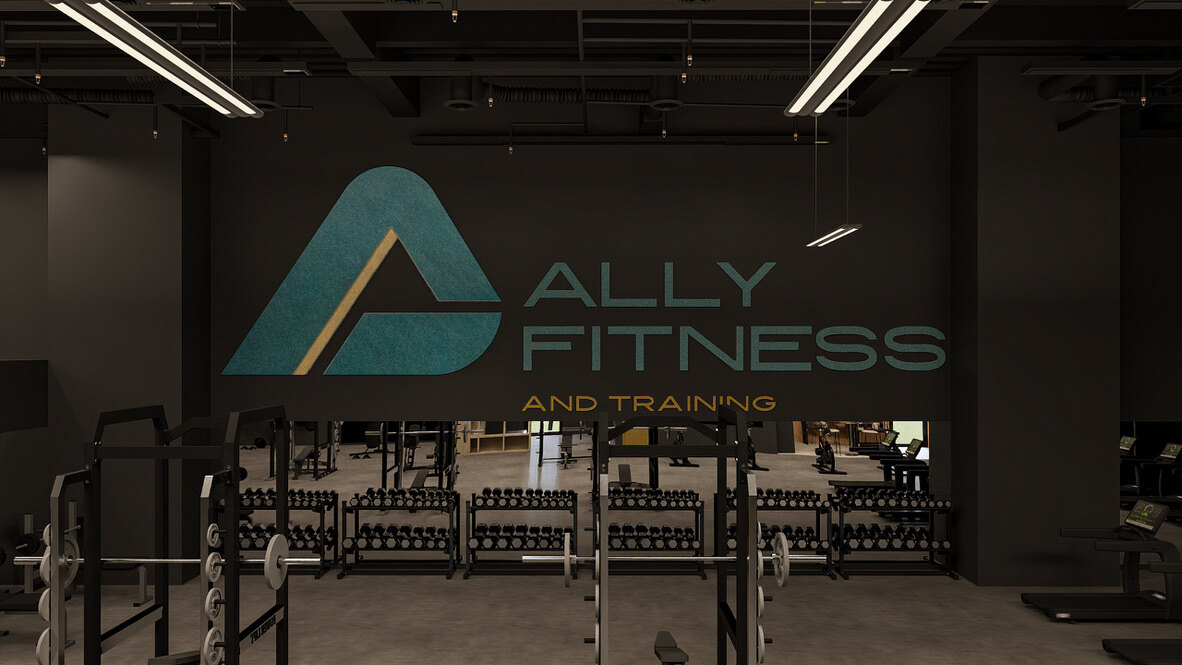 Ally Fitness new location: feature wall with power racks and dumbbells
